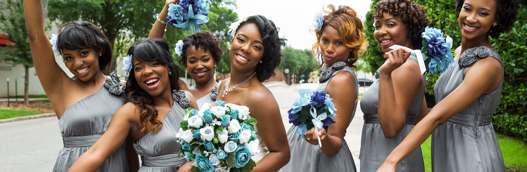 Happy African American bride with her bridesmaids